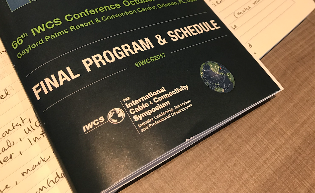 Here, the IWCS conference hashtag is printed on the program and schedule.