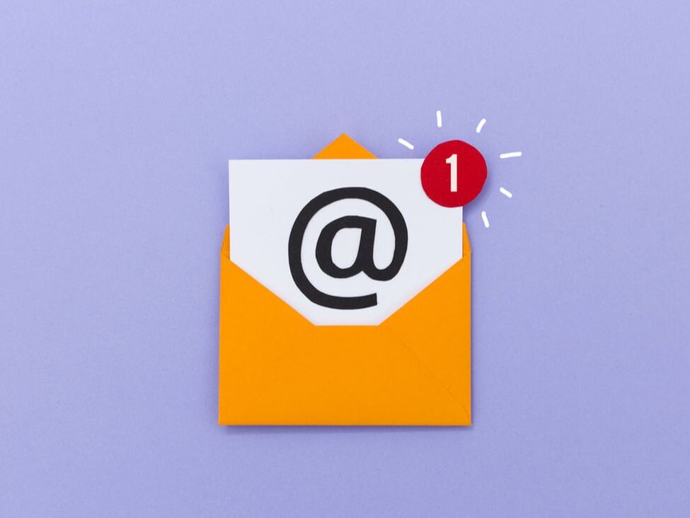 An email notification pops out of an envelope.